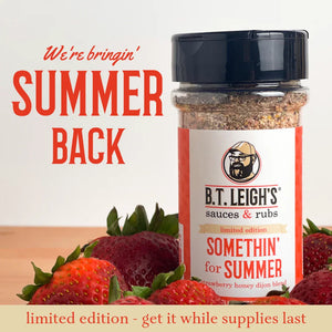 B.T. Leigh's Somethin' For Summer limited edition rub bottle with strawberries on table