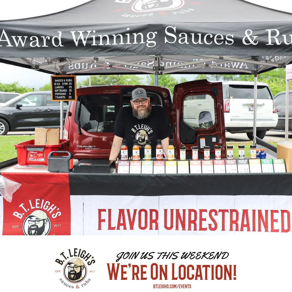 B.T. Leigh's Sauces and Rubs market booth with artisanal BBQ sauces display and branded tent.