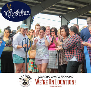 SOKY Marketplace ribbon cutting event with crowd, promoting B.T. Leigh's Sauces and Rubs booth.