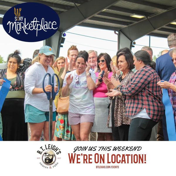 SOKY Marketplace ribbon cutting event with crowd, promoting B.T. Leigh's Sauces and Rubs booth.