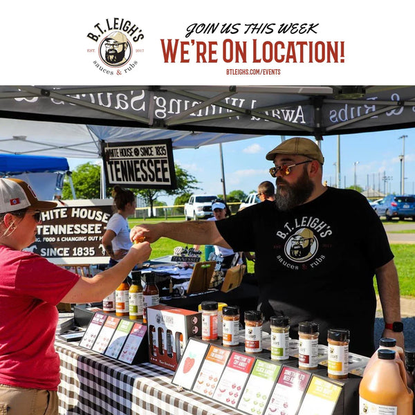 B.T. Leigh's Sauces and Rubs outdoor market booth with staff sharing artisanal barbecue sauces