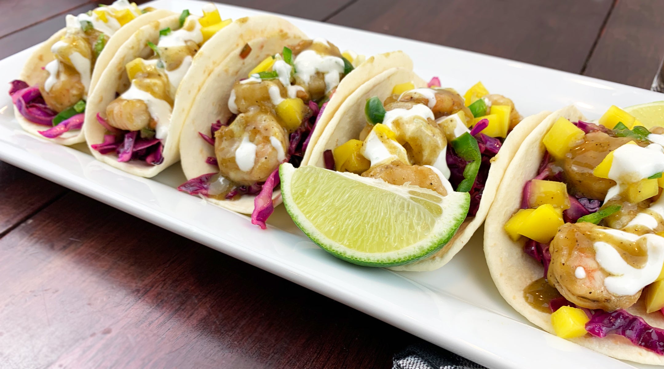 https://btleighs.com/cdn/shop/articles/shrimp_taco_banner.jpg?v=1588639742&width=2160