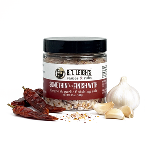 A jar of B.T. Leigh's Somethin' To Finish With Finishing Salt - Aleppo & Garlic